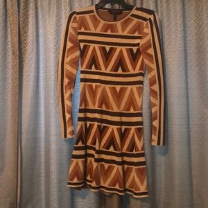 Geometric design, fitted BCBGMAXAZRIA dress.